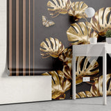 Tapet personalizat fine art cu frunze aurii de monstera pe un fundal negru brass monstera