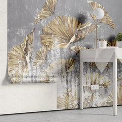 Tapet personalizat leaf cu frunze aurii pe un perete texturat gri golden leaves