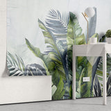 Tapet personalizat leaf cu frunze tropicale in acuarela in nuante vibrante de verde si albastru pe un fundal deschis aducand prospetime si vitalitate watercolor green leaves