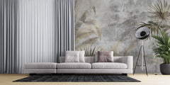 Tapet personalizat leaf cu frunze de palmier si alte plante exotice in tonuri de bej si gri pe un fundal cu aspect de stucada pentru un stil rustic modern gold concrete leaves