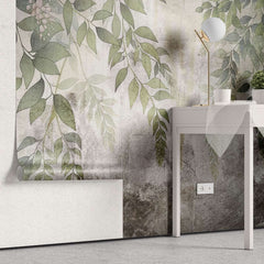 Tapet personalizat leaf cu frunze si ciorchini de flori in nuante de verde violet si roz pe un fundal cu aspect de perete vechi tencuit ideal pentru a crea o atmosfera de gradina interioara cu un aer rustic si boem stucco printed leaves