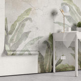 Tapet Personalizat Leaf cu bananieri in fundal stucco vintage - CRACKED WALL LEAVES