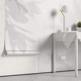 Tapet Personalizat Leaf cu umbre de frunze pe un perete alb texturat - STUCCO SHADOWS