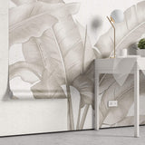 Tapet Personalizat Leaf cu frunze bej de bananier pe un fundal de plaster - DOTS BANANA LEAVES