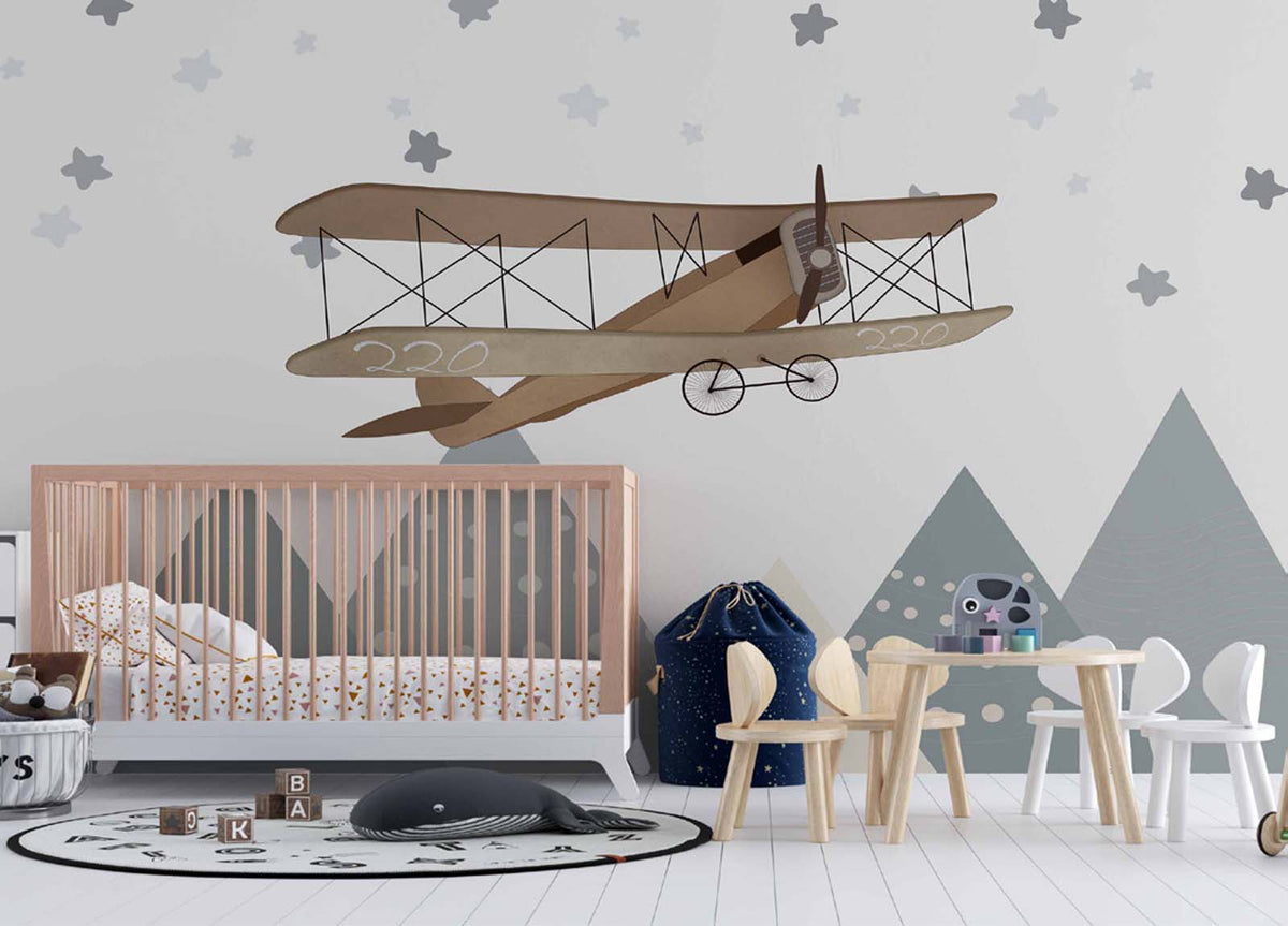Tapet Personalizat Micii Exploratori cu avion biplan peste varfuri de munti si cer instelat - OVER THE PEAKS BIPLANE